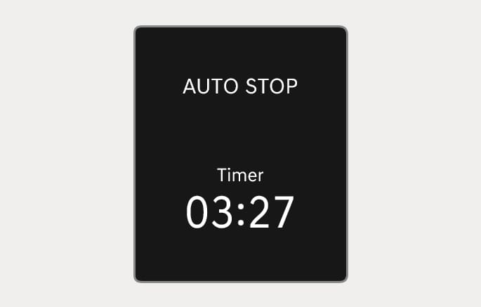 2025 Genesis GV70 Auto Stop display image. The screen shows the text 'AUTO STOP' and 'Timer' with the time '03:27'. It explains the function of displaying the elapsed time of engine stop by the Idle Stop and Go system.