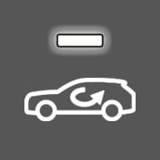 2025 Genesis GV70 air recirculation mode indicator icon. The image displays a car outline with a curved arrow inside, representing internal air circulation, and a rectangular light bar above it. Explains the function of the air intake control indicator.
